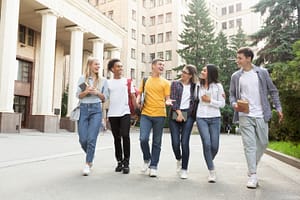 free time of students, teens walking after passing test